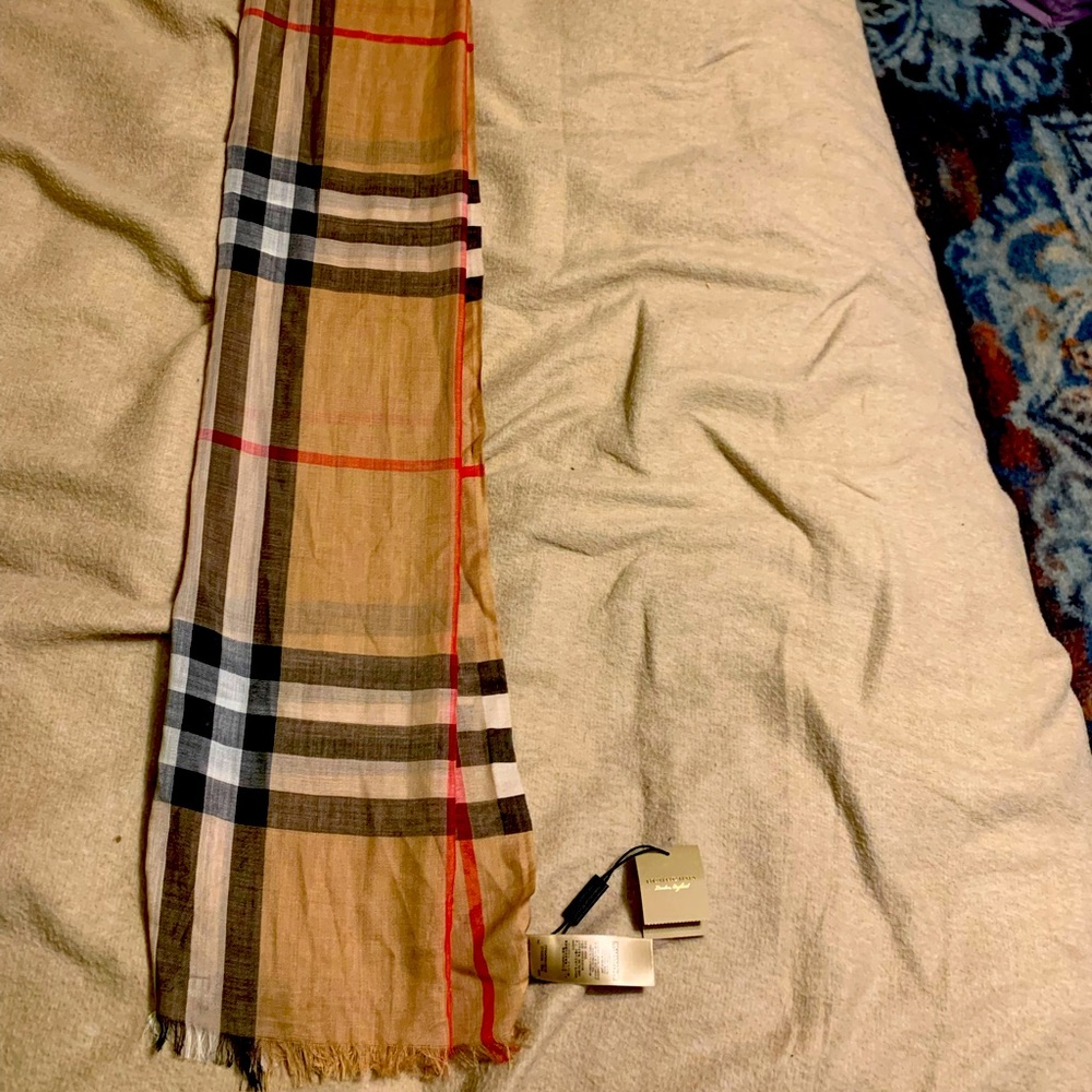 I have a authentic Burberry scarf like new with tags still attached